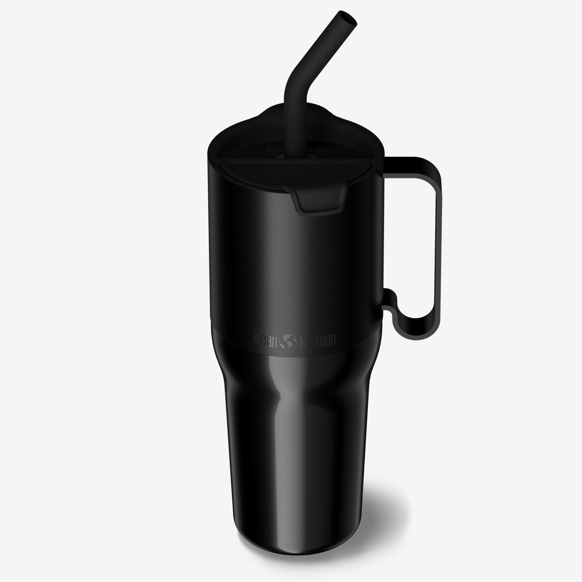 Black travel mug with a handle and straw on a light gray background