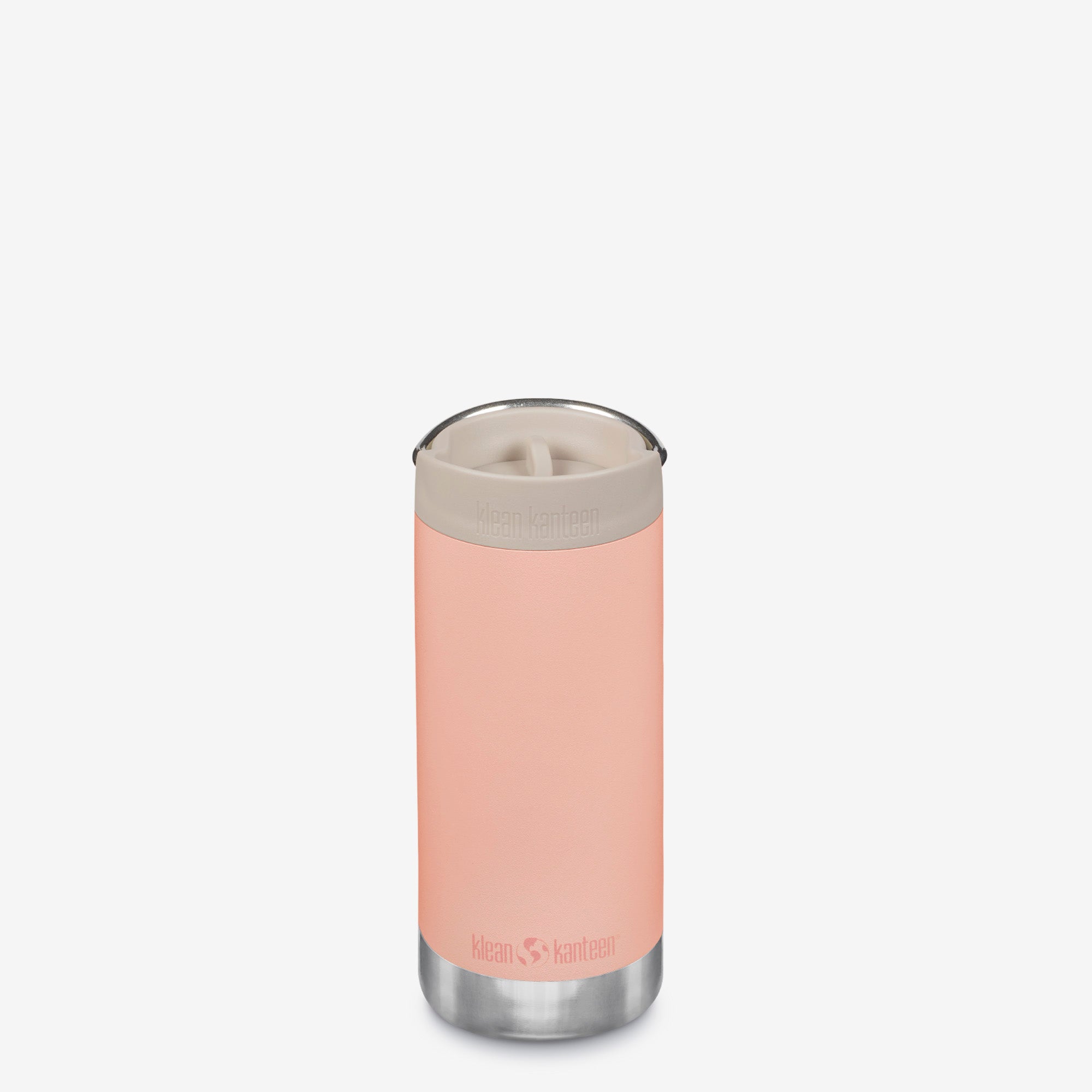 Pink insulated tumbler with a silver base and lid on a white background