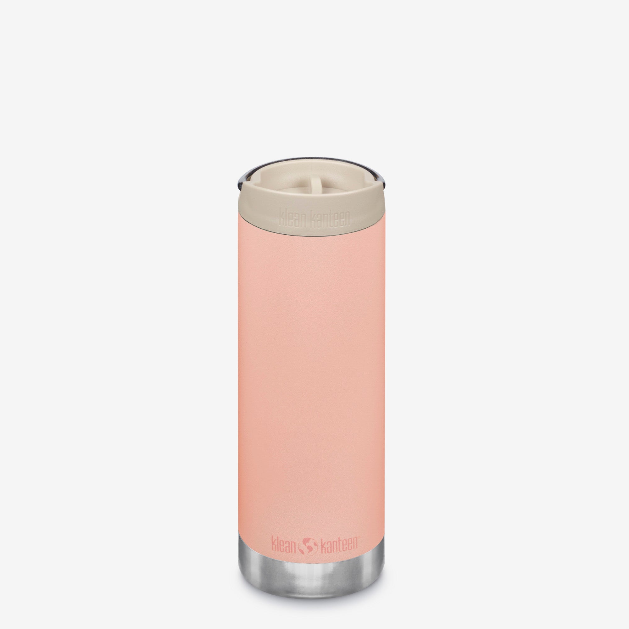 Pink insulated tumbler with a beige lid on a white background
