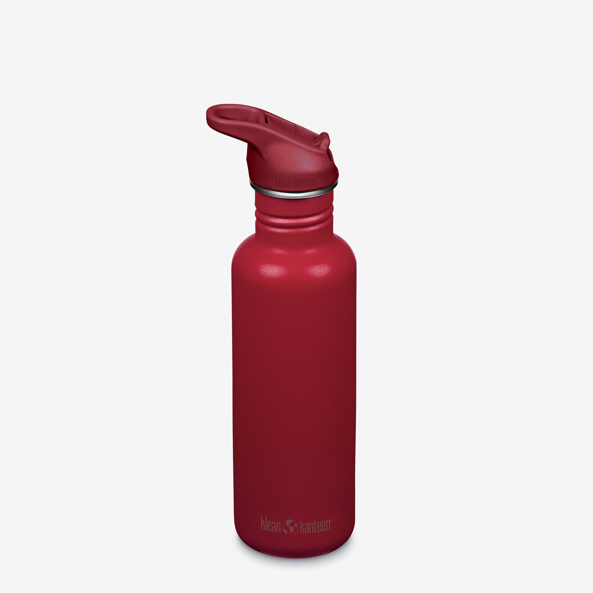 Red water bottle with a screw-on cap on a light gray background